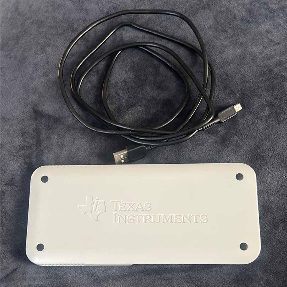 Texas Instruments White Device with Black USB Cable